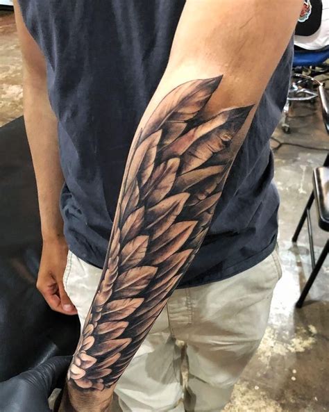 forearm wing tattoo meaning